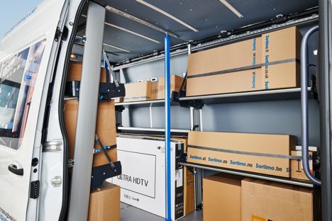 Kassevogne kan bygges op med fleksible reolsystemer